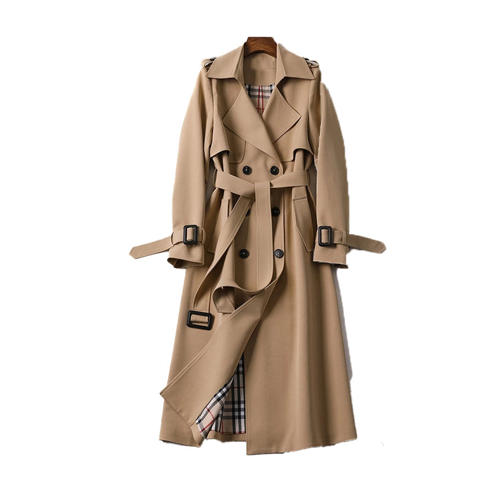 Beige double-breasted long trench coat with belt, featuring a classic collar and long sleeves, styled for luxury fall fashion.