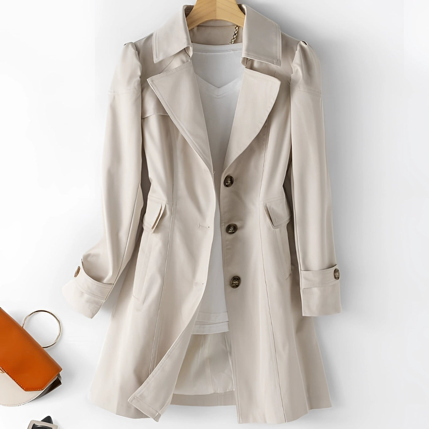 Beige women's double-breasted long trench coat with belt, lightweight and stylish, featuring a collar and long sleeves.