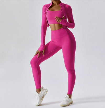 Bright pink seamless workout set for women featuring a high-waist design with leggings and a matching crop top.