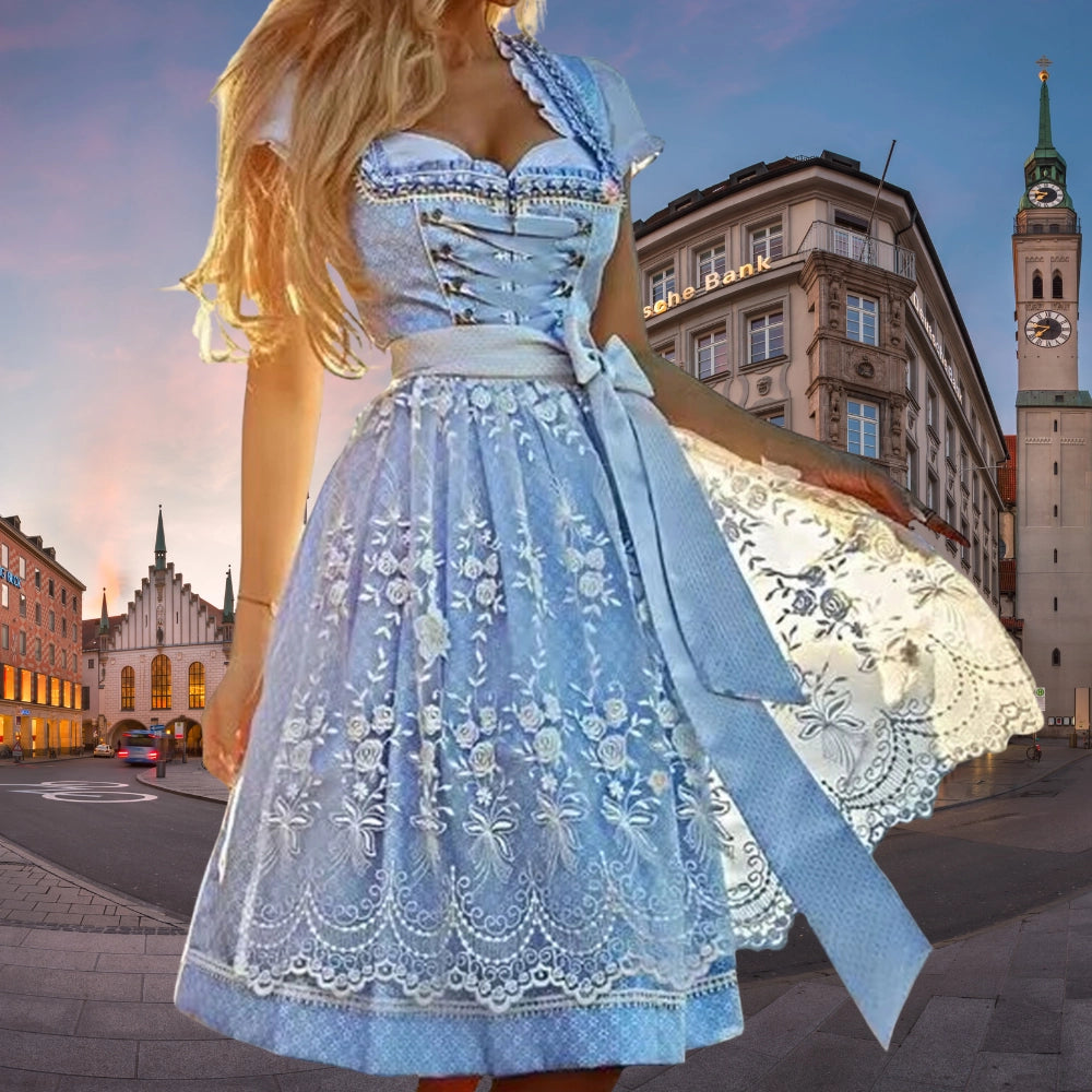 Elegant blue embroidered dirndl dress with lace apron, featuring short sleeves and fitted waist, displayed near a window with a building in the background. Suitable for Oktoberfest. Size 5XL.