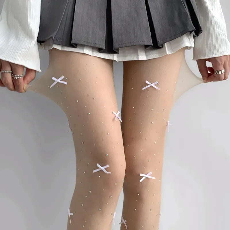 Simone | Playful tights with bow pattern