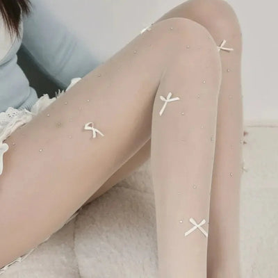 Simone | Playful tights with bow pattern