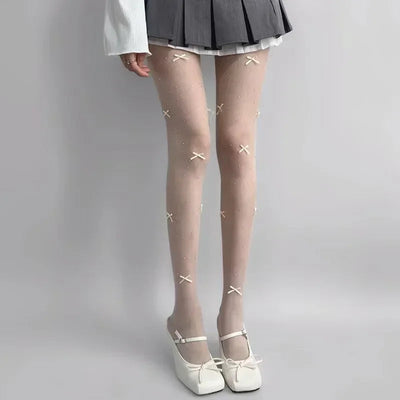 Simone | Playful tights with bow pattern