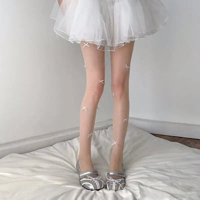 Simone | Playful tights with bow pattern