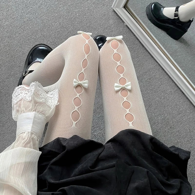 Stefanie | Thigh high tights with bow details