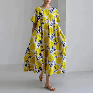 https://cdn.shopify.com/s/files/1/0741/0774/8619/files/robe-longue-jaune-imprim_-fleurs.webp?v=1726495667